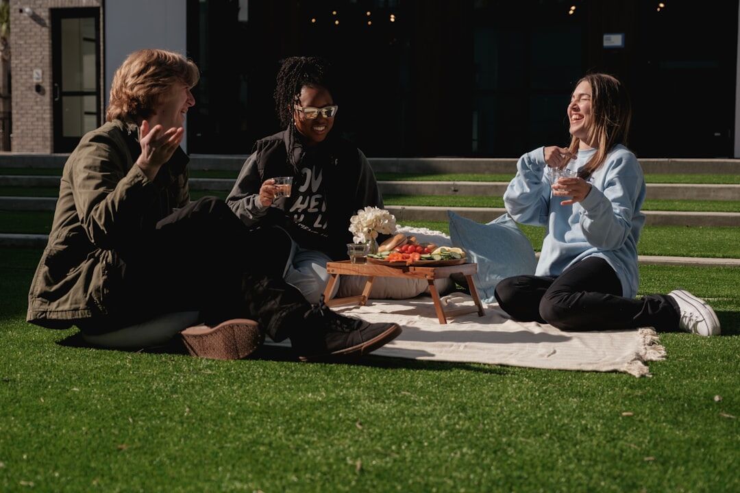 Group of friends having an outdoor conversation and laughing together
